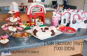 Farm Party Food Table Ideas with farm animal cupcakes tin buckets and farm animal plates and cups